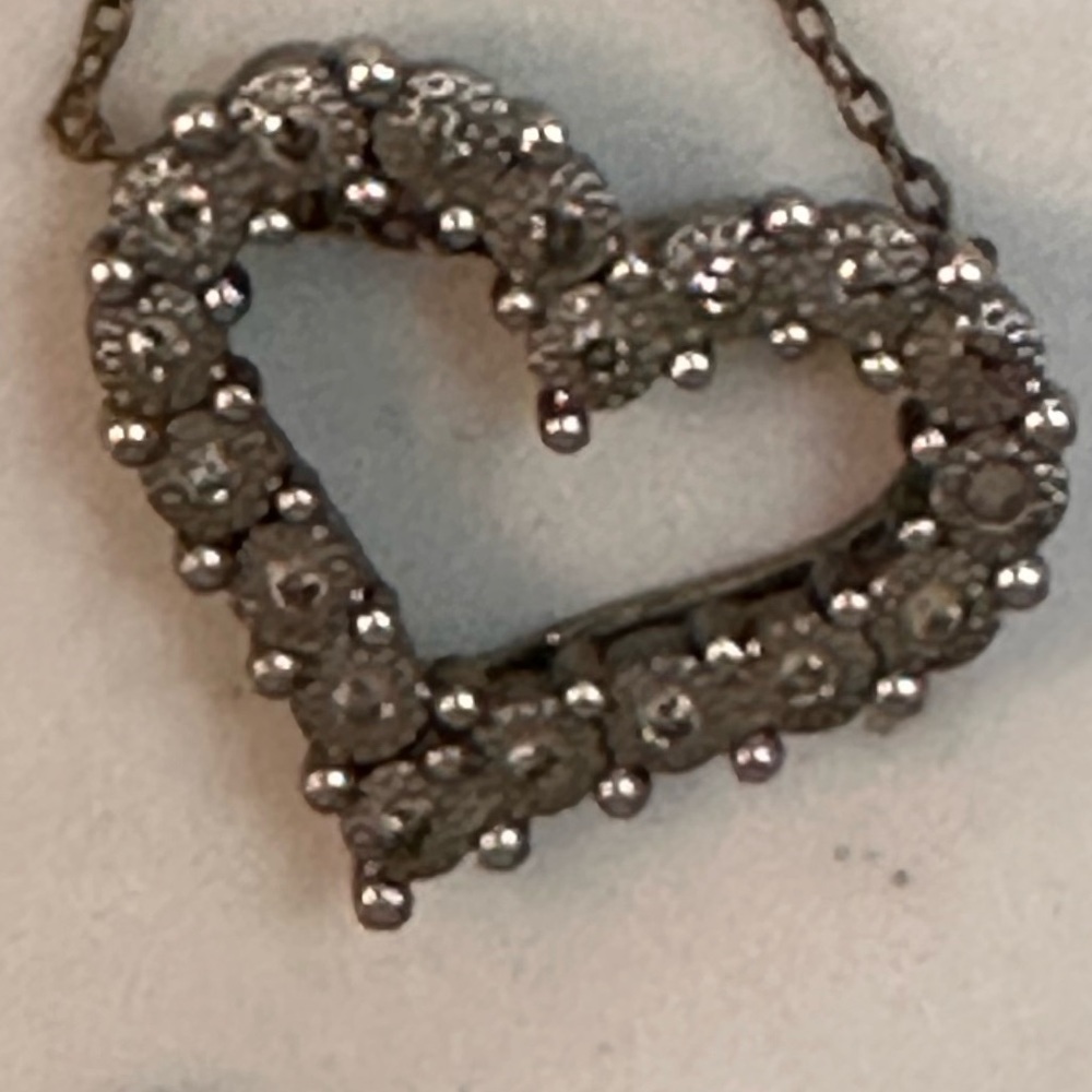Genuine diamond and 9.25 sterling heart pendant with 30” chain